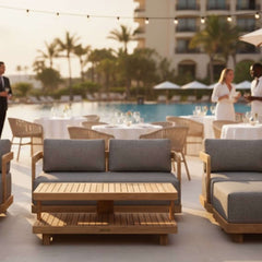 Six-piece Anderson Teak Granada deep seating outdoor sofa set with teak wood frames, cushions, and coffee table for garden lounge.
