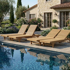 Anderson Teak sun lounger set with A-grade teak wood, adjustable backrest, in a garden outdoor setting with nine designer color options.