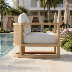 Anderson Teak JUNUS lounge teak wood armchair with deep outdoor seating in a designer color, perfect for patio and garden.