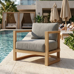 Anderson Teak JUNUS lounge teak wood armchair with deep seating, outdoor patio accent chair in designer color options.