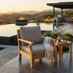 Anderson Teak Riviera modular teak wood armchair in deep seating style, suitable for outdoor patio and garden setting.