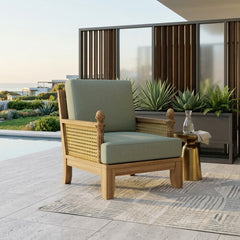 Anderson Teak Luxe Teak Wood Deep Seating Accent Chair for outdoor patio and garden with plush cushions and teak wood frame.