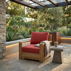 Anderson Teak teak wood accent armchair with deep seating, outdoor patio or garden furniture in a natural wood finish.