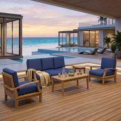 Outdoor patio sofa from Anderson Teak Brianna Deep Seating collection, featuring plush cushions in a garden lounge setting.