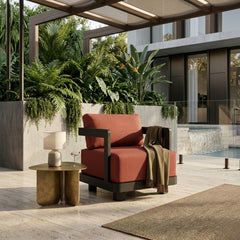 Anderson Teak Granada Aluminum Swivel Armchair with deep seating, shown in a vibrant designer color, suitable for patio and garden use.