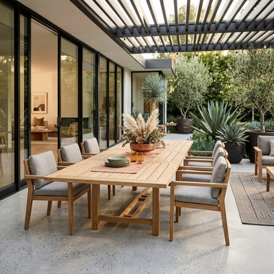 Anderson Teak Bahama 157-inch rectangular double extension table with extra thick wood for outdoor dining or large gatherings.