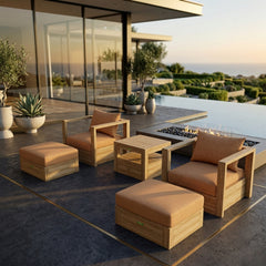 Set of two teak wood outdoor armchairs and two ottomans from Anderson Teak in vibrant designer colors, perfect for garden lounge seating.