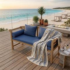 Anderson Teak Brisbane deep seating sofa in outdoor patio setting, featuring plush cushions and available in 9 designer colors.