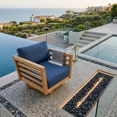 Anderson Teak Cordoba deep seating swivel armchair with colorful outdoor cushions, designed for patio and garden relaxation.