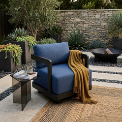 Anderson Teak Granada aluminum swivel armchair with deep outdoor seating, available in nine designer colors for patio and garden.