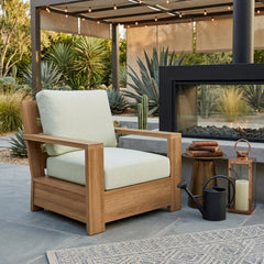 Teak wood deep seating armchair by Anderson Teak, outdoor accent chair with plush cushions in various designer colors for patio or garden.
