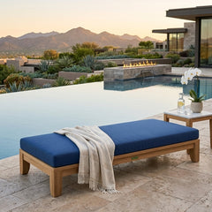Riviera 72-inch outdoor daybed by Anderson Teak with A-grade teak wood, shown in a designer color for garden lounging.
