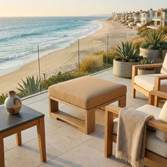 Anderson Teak Capistrano deep seating ottoman in a designer color, showcasing a luxury outdoor teak footstool for patio use.