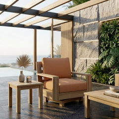 Anderson Teak Madera swivel armchair in a deep outdoor seating style, shown in a stylish designer color for patio and garden use.