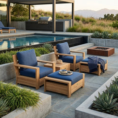 Anderson Teak 5-piece teak wood deep seating sofa set with cushions, outdoor patio furniture in a garden setting.