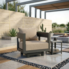 Anderson Teak Coronado aluminum swivel armchair in a stylish outdoor setting, available in 9 designer colors for patio and garden lounging.