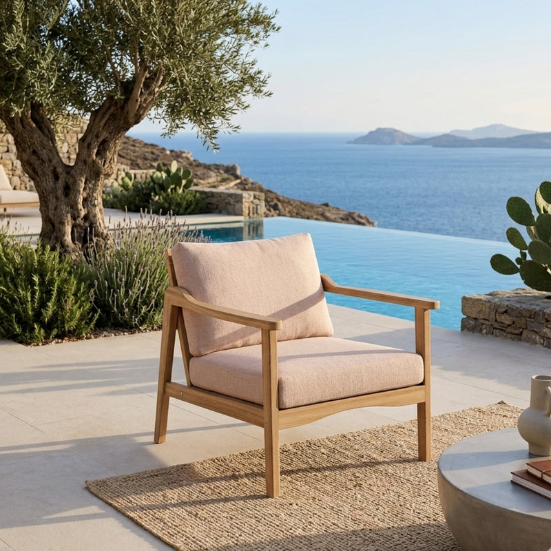 Anderson Teak Amalfi deep seating armchair in outdoor patio setting, available in 9 designer colors for garden and outdoor lounging.