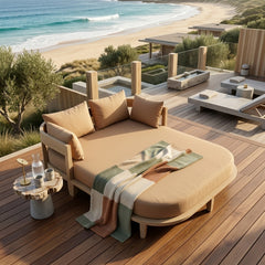Outdoor Anderson Teak Coronado Daybed with cushions in a garden lounge setting, available in 9 designer colors for outdoor patio relaxation.