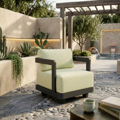 Anderson Teak Granada aluminum swivel armchair with deep outdoor seating, shown in vibrant designer color for patio and garden.