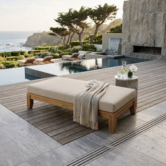Riviera 60-inch outdoor daybed by Anderson Teak with A-grade teak wood, designed for garden lounge in a stylish outdoor setting.