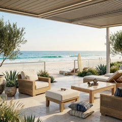 Luxury Anderson Teak outdoor ottoman with cushion, featuring a sleek design in a natural teak finish, perfect for patios.
