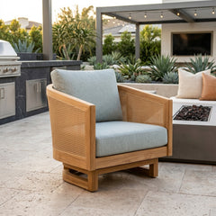 Anderson Teak Catania swivel chair in teak wood with deep seating, available in 9 designer colors for outdoor patio and garden use.