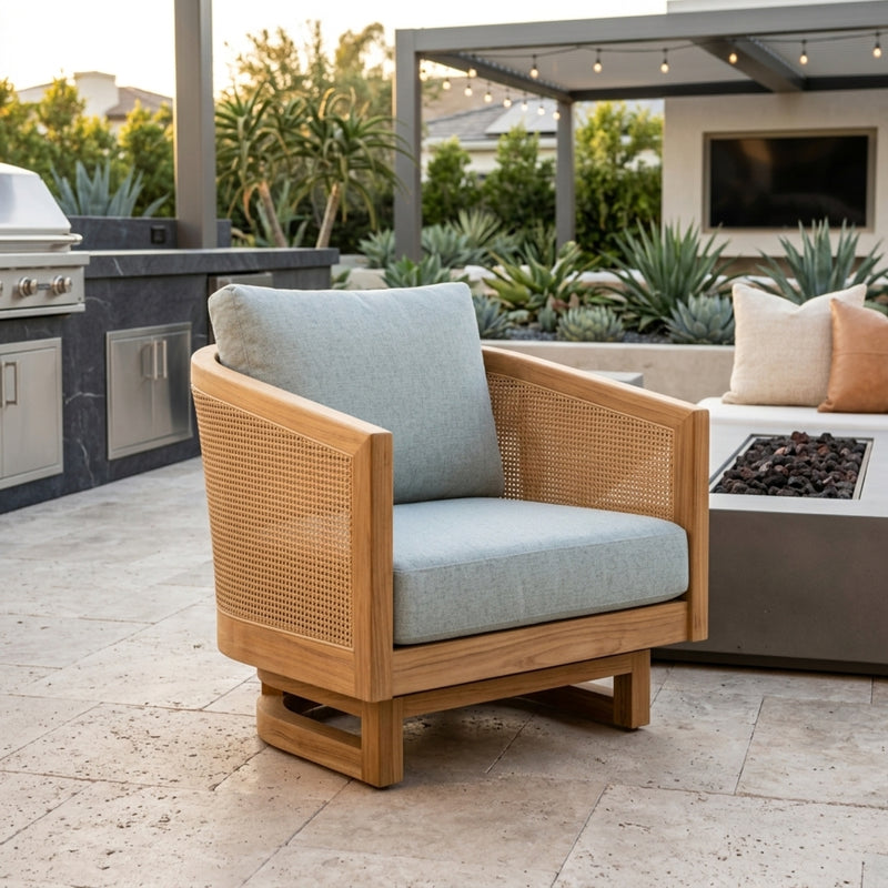 Anderson Teak Catania swivel chair in teak wood with deep seating, available in 9 designer colors for outdoor patio and garden use.