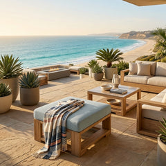 Anderson Teak Capistrano deep seating ottoman in natural teak finish, designed as a luxury outdoor patio footstool with 9 color options.