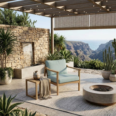 Anderson Teak Amalfi deep seating armchair in outdoor patio setting, available in 9 designer colors, perfect for garden relaxation.