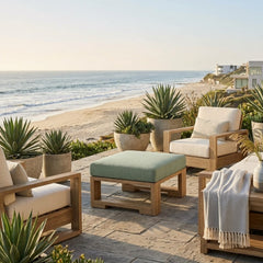 Anderson Teak Capistrano deep seating ottoman in natural teak with a cushioned top, available in six designer colors for outdoor patio use.