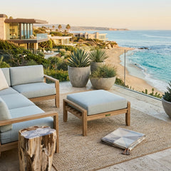 Anderson Teak NATSEPA outdoor teak wood ottoman in a designer color, perfect as a patio footstool with a stylish and durable design.