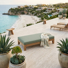 Outdoor daybed by Anderson Teak featuring A-grade teak wood, with plush cushions in designer colors for garden lounge relaxation.