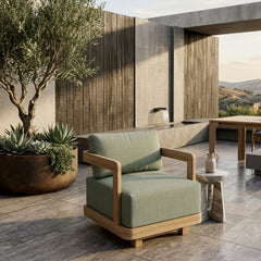 Anderson Teak Granada Swivel Armchair with deep outdoor seating, shown in one of seven designer colors, suitable for patio and garden.