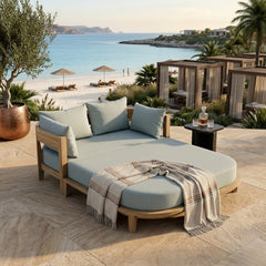 Outdoor Anderson Teak Coronado Daybed with plush cushions in vibrant designer colors, perfect for garden lounge relaxation.