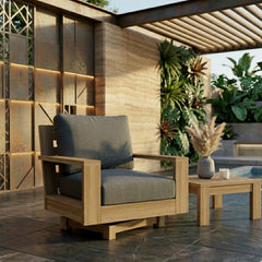 Anderson Teak Madera swivel armchair in outdoor deep seating style, featuring a stylish design with a natural wood finish and cushion.