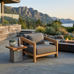 Anderson Teak Smyrna lounge armchair with teak wood frame and cushions in vibrant designer colors, perfect for outdoor patio or garden.