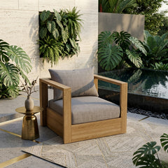Anderson Teak COPACABANA deep seating armchair in natural wood finish, outdoor patio accent chair with plush cushions and designer colors.