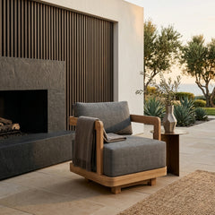 Anderson Teak Granada Swivel Armchair with deep outdoor seating, shown in a designer color for patio and garden use.