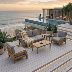 Anderson Teak Brianna deep seating outdoor sofa set with plush cushions, in a garden lounge setting, available in nine designer colors.