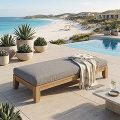 Outdoor daybed by Anderson Teak with A-grade teak wood, featuring a sleek design and available in nine designer colors.
