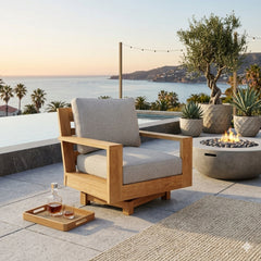 Anderson Teak Madera swivel armchair in outdoor deep seating style, shown in a stylish designer color for patio and garden use.