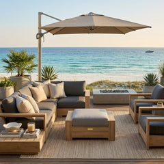 Luxury Anderson Teak outdoor ottoman with 9 designer colors, featuring a sleek teak footstool for patio relaxation.