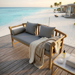 Anderson Teak Brisbane deep seating bench sofa in outdoor patio setting, showcasing luxurious garden furniture in a designer color.