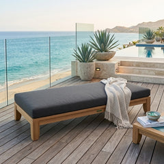 Outdoor daybed by Anderson Teak with A-grade teak wood, featuring a stylish design and available in nine designer colors.