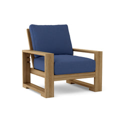 Anderson Teak Capistrano Deep Seating Armchair in cast pomegranate, outdoor accent chair with luxurious garden and patio design.