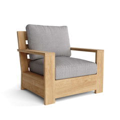Anderson Teak Madera deep seating accent armchair in nine designer colors, showcasing a stylish wooden frame and plush cushions.