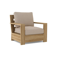 Anderson Teak Madera deep seating accent armchair with 9 designer color options, showcasing a stylish wooden chair design.