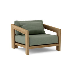 Anderson Teak Smyrna Lounge Armchair in cast pomegranate, outdoor teak accent chair with deep seating for patio or garden.