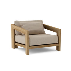 Anderson Teak Smyrna Lounge Armchair in Cast Pomegranate, outdoor teak accent chair with deep seating, available in 9 designer colors.