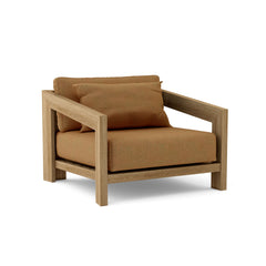 Anderson Teak Smyrna Lounge Armchair in cast pomegranate, outdoor teak accent chair for patio and garden, available in 9 designer colors.